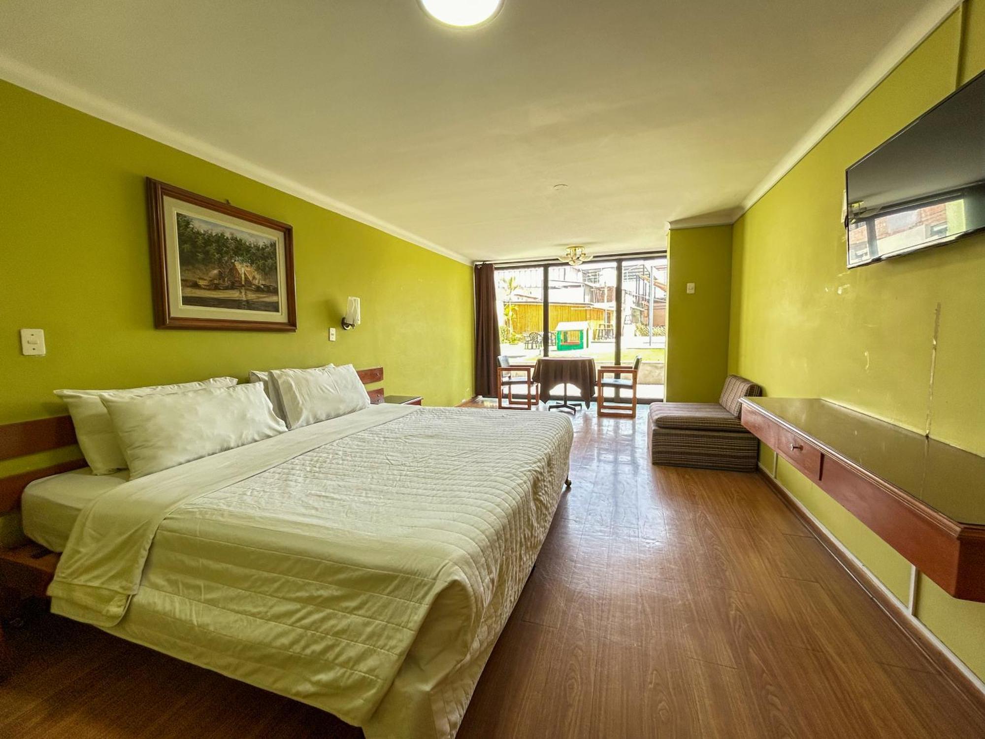 Holiday Suites Τάκνα Δωμάτιο φωτογραφία
